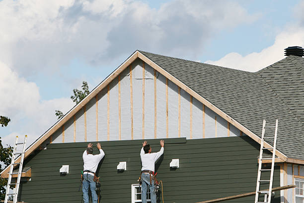 Professional Siding technician working in Triadelphia, WV